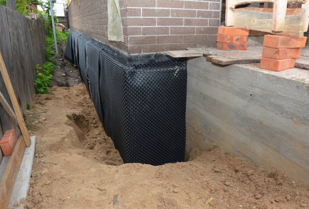 Happy homeowners after waterproofing job in Montville